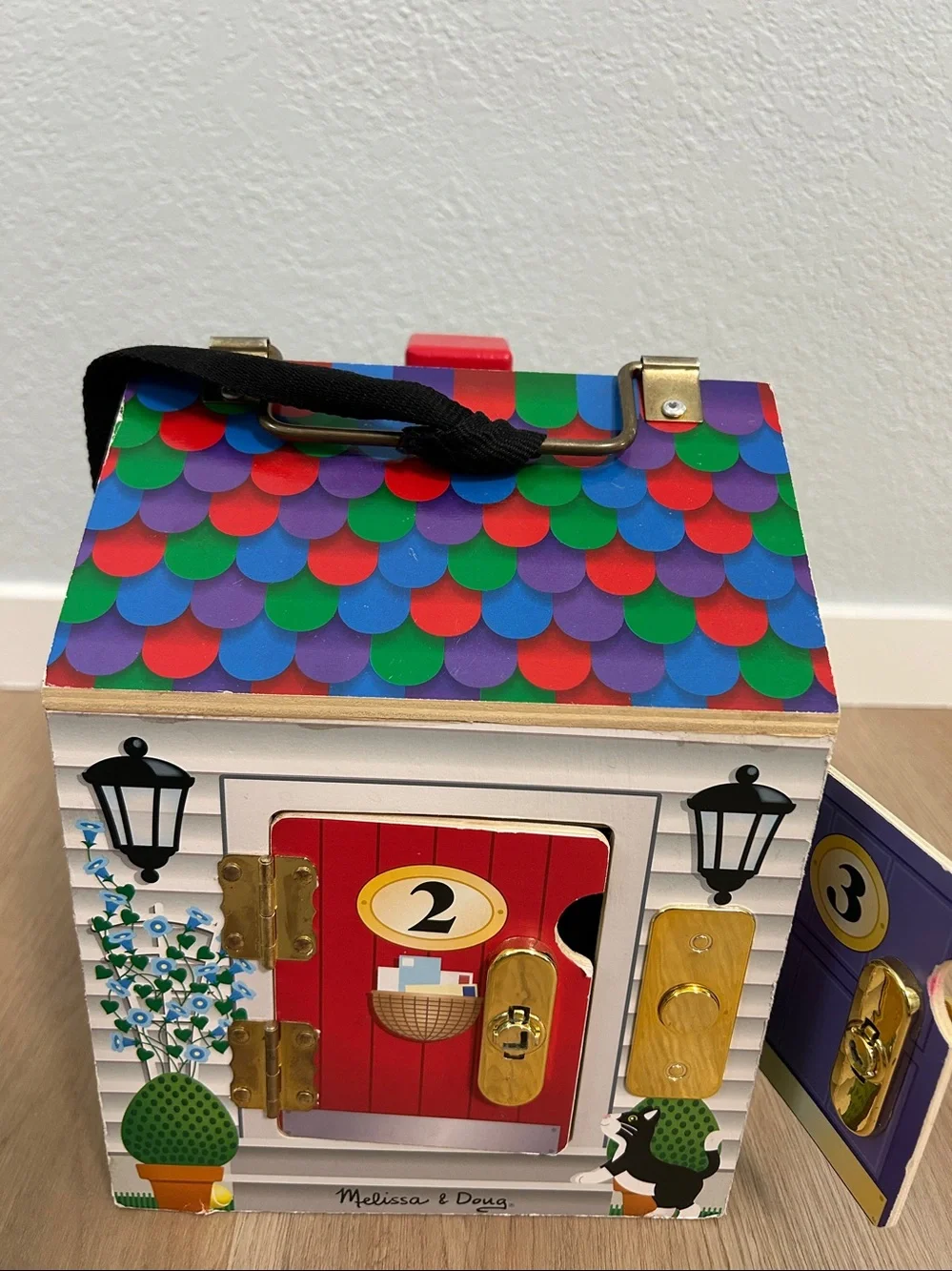Melissa & DougTake-Along Wooden Doorbell Dollhouse -Doorbell Sounds, Keys-Toy